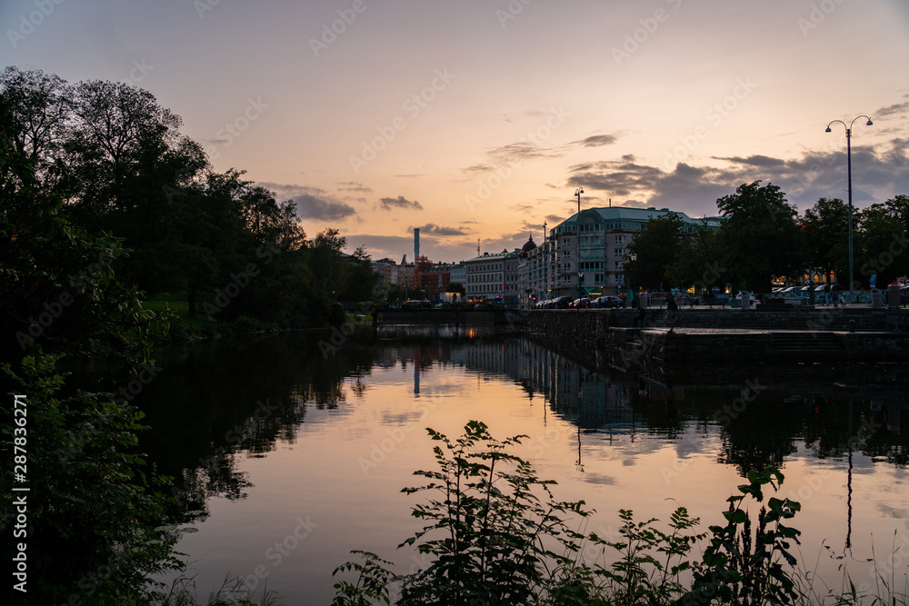 sunset in Goteborg Sweden with the reflection on the river