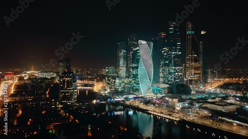 Wallpaper Mural Beautiful view from above to Moscow City Center on the night with bright glittering lights of buildings, streets and traffic. Camera slowly moves towards skyscrapers showing amazing cityscape. Torontodigital.ca