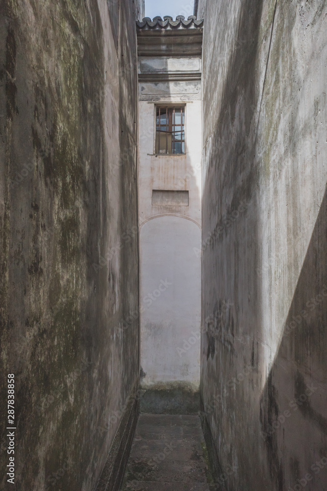 Narrow alley in Nanxun, Zhejiang, China Narrow alley in Nanxun, Zhejiang, China