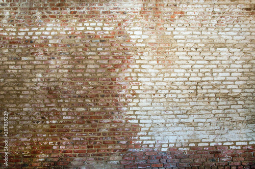 An old weathered brick wall.