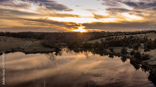 Nebraska countryside landscape trees  water  and sky with clouds