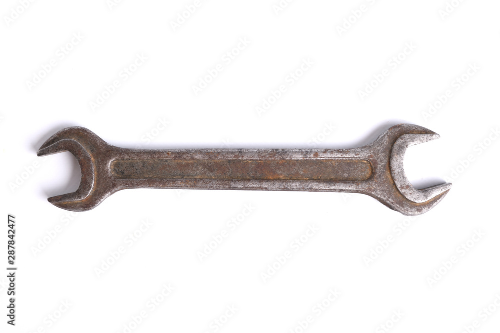 Old rusty stainless steel crescent wrench isolated on white top view Old rusty stainless steel crescent wrench isolated on white top view