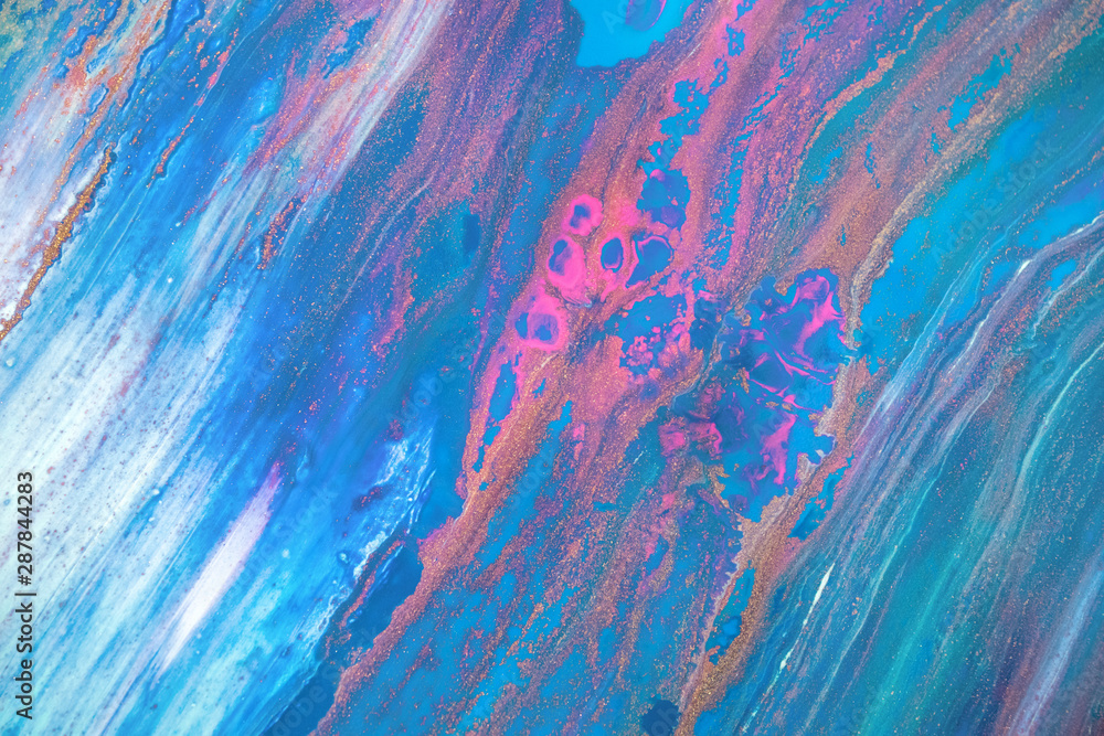 Abstract created using the technique of liquid acrylic. Macro photography of the smallest details of a picture. The picture shows how overflows of shades and colors of paint resemble space motifs.