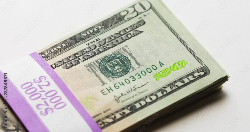 US Money Thrown Down On White Background US Money Thrown Down On White Background
