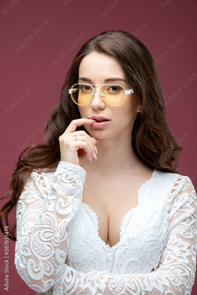 Portrait of a beautiful girl in glasses with a smile Portrait of a beautiful girl in glasses with a smile