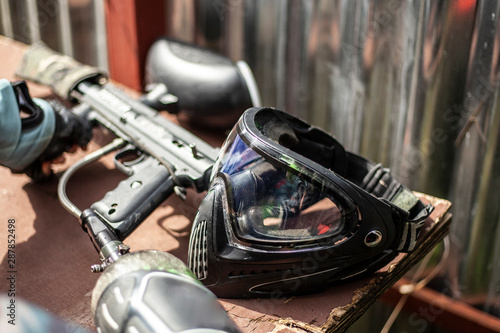 Mask to protect the face from paint shots. Sports equipment for the game of paintball. A transparent mask covering the entire face. © Олег Копьёв