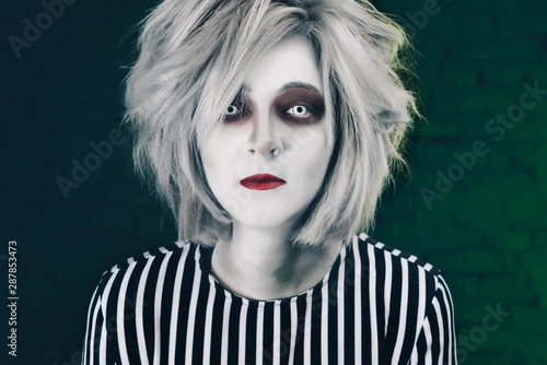 Wallpaper Mural creepy portrait of halloween girl. Creepy eye lenses and make-up for a Halloween party. Torontodigital.ca