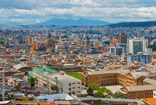 Cityscape and aerial view with skyscrapers of the modern city part of Quito, the capital of Ecuador located in the Andes mountain range, South America.