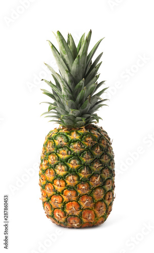 Tasty whole pineapple with leaves on white background