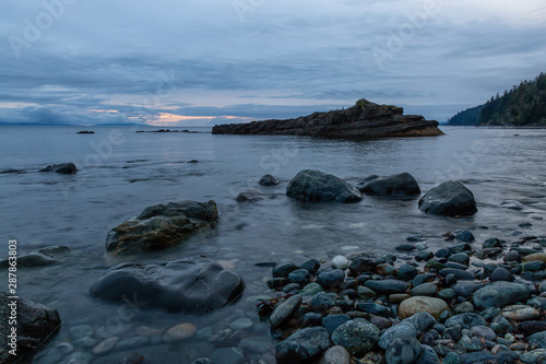 Beautiful View of a rocky beach on the Juan de Fuca Trail during a summer sunset. Taken at Chin Beach, near Port Renfrew, Vancouver Island, BC, Canada. © edb3_16