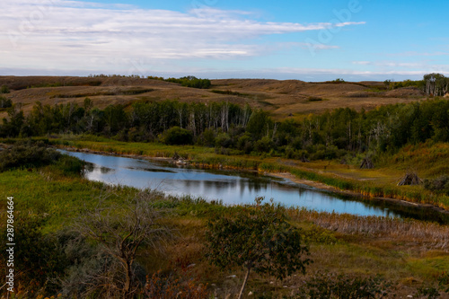 Pond in the rural Saskatchewan prairies