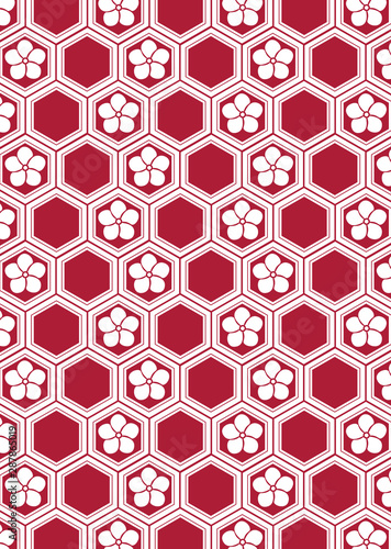 亀甲柄に梅をあしらった和柄の背景素材