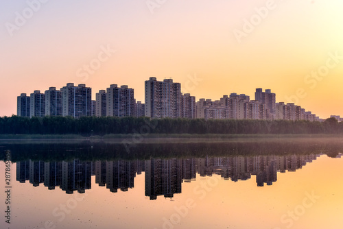 Skyline and Four Seasons Landscape of Waterfront City © Xiangli