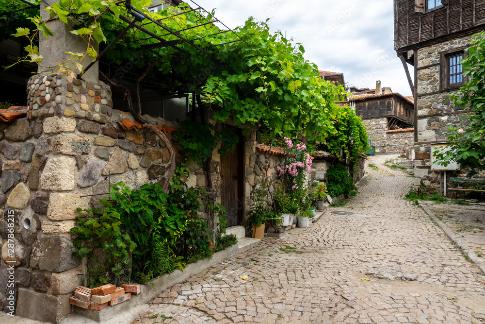 Narrow streets of an ancient seaside town of Sozopol on the southern Bulgarian Black Sea Coast. Narrow streets of an ancient seaside town of Sozopol on the southern Bulgarian Black Sea Coast.