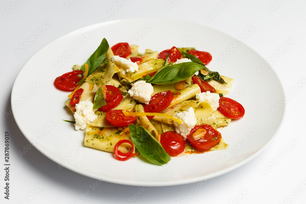 Italian pasta with a pesto sauce Italian pasta with a pesto sauce