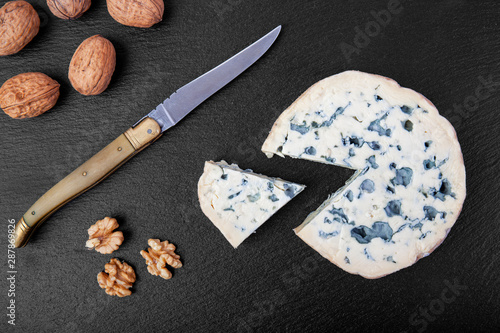 french cow's milk cheese called Fourme d'Ambert on a plate