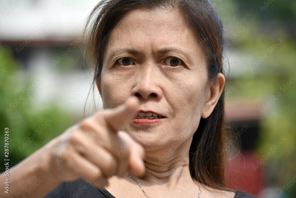 Fotografie Retired Asian Female Senior And Anger