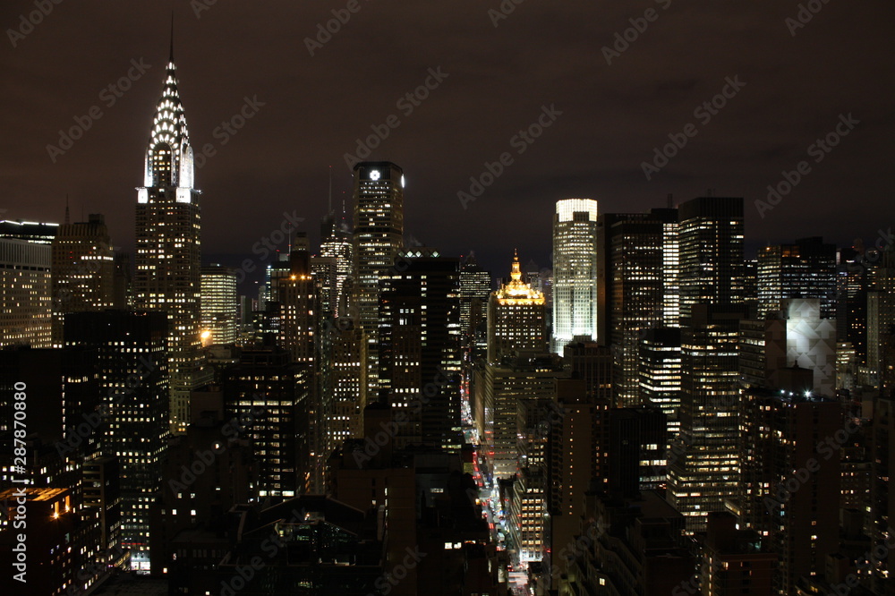 New York City landscape in deep night showing these amazing city lights