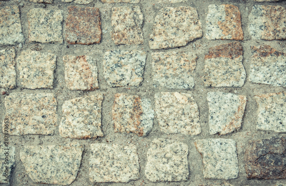 Footpath made of stones as background or backdrop Footpath made of stones as background or backdrop