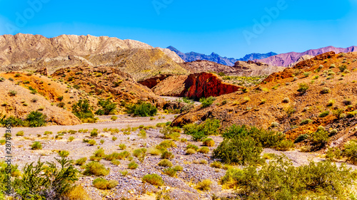 Northshore Road SR167 in Lake Mead National Recreation Area winds through semi desert landscape with colorful mountains between Boulder City and Overton in Nevada, USA photo