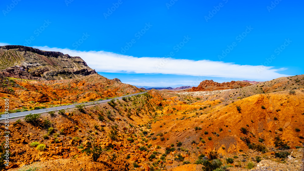 Northshore Road SR167 in Lake Mead National Recreation Area winding through semi desert landscape with colorful mountains between Boulder City and Overton in Nevada, USA