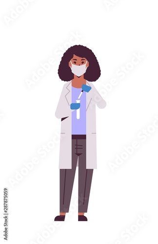 female scientific researcher holding test tube african american woman in uniform working with flask scientist making experiment in laboratory research science chemical concept vertical full length