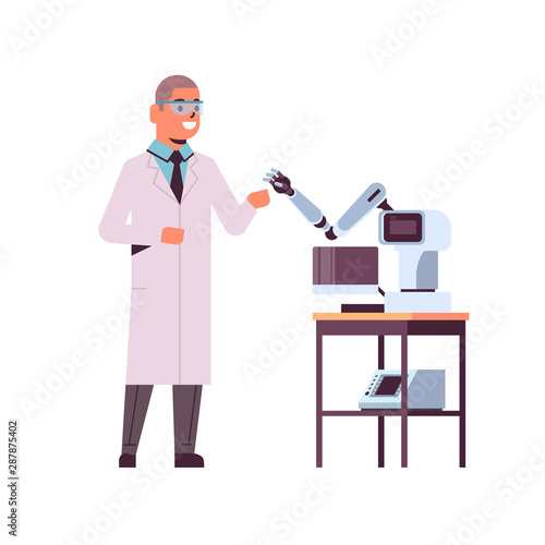 male scientist near industrial robotic arm man in uniform with robot manipulator smart medical machine automatic technology concept full length flat