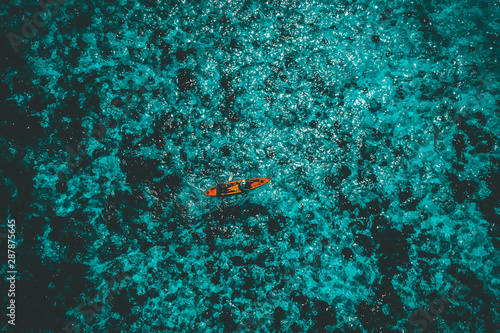 Aerial View of tourists paddle kayak in Boulder Island or Nga Khin Nyo Gyee Island, Myanmar photo