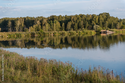 small lake in the forest. lake in Russia. Lake Shore. to fish on the lake. beautiful landscape. admire the lake.