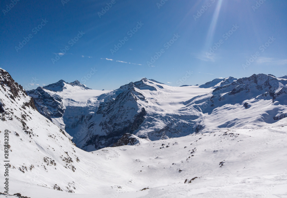 Naklejka premium Fantastic view at the arrival of the cableway Presena to the glacier Adamello, Lobbie, Presanella and Pian di Neve