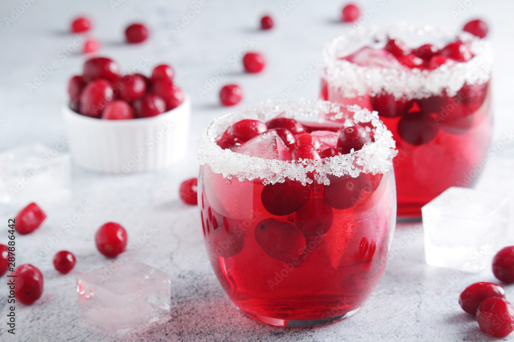Glasses with red cranberry cocktail Glasses with red cranberry cocktail