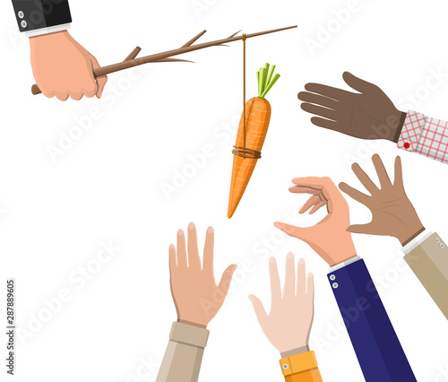 Carrot on a stick in hand. Motivation, stimulus, incentive and reaching goal concept metaphor. Fishing wooden stick with hanging carrot