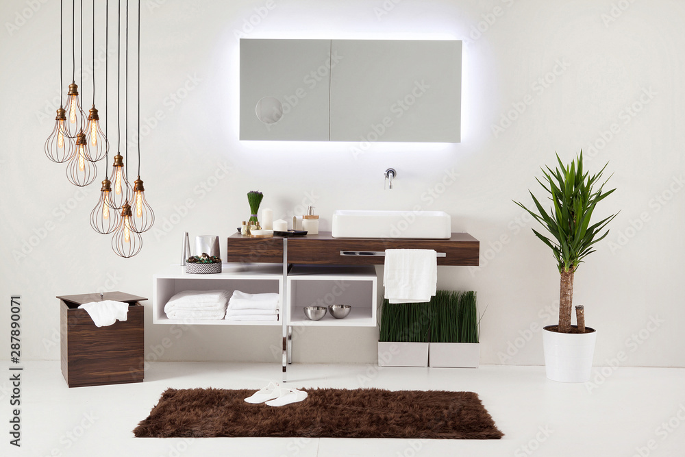 Fototapeta premium brown cupboard designed clean bathroom decorative lamp