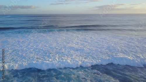 Wallpaper Mural Drone aerial reveal of beach with big waves at sunrise Torontodigital.ca