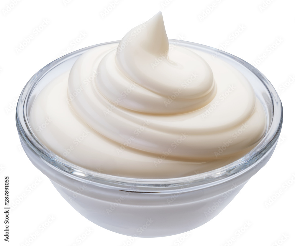 Mayonnaise swirl in glass bowl. Clipping path. Mayonnaise swirl in glass bowl. Clipping path.