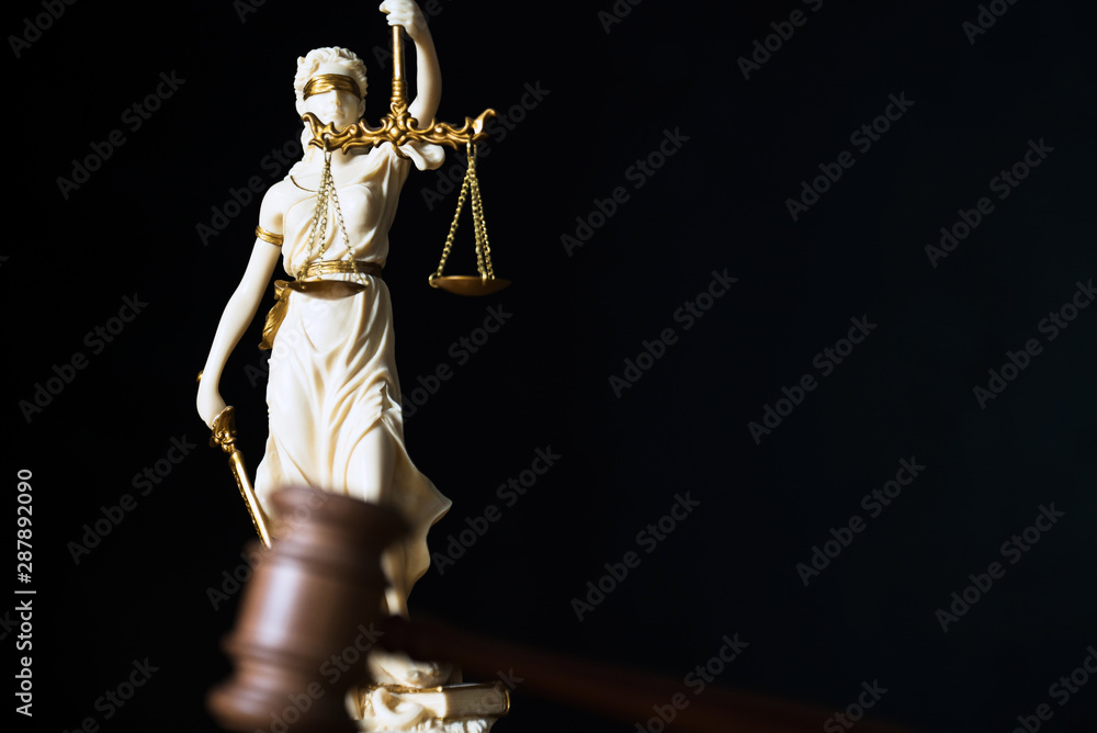 Law and Justice, judge gavel, book with Statue of blind goddess Themis on wooden table. Law and Justice, judge gavel, book with Statue of blind goddess Themis on wooden table.