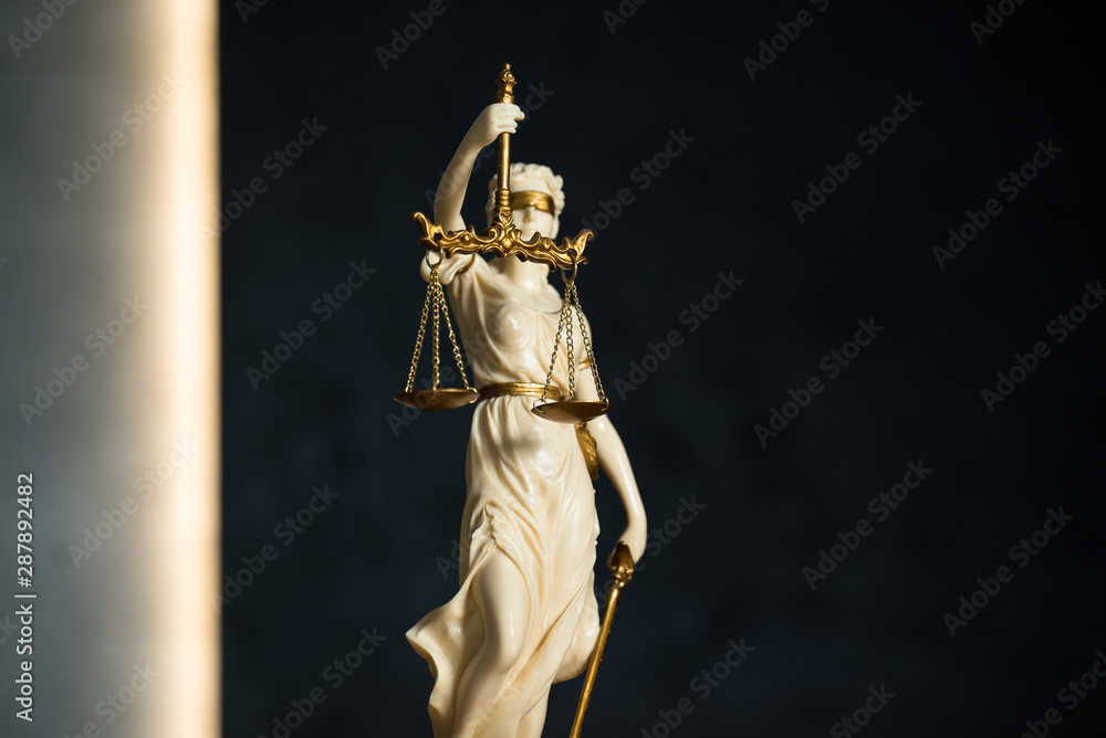 Obraz premium Law and Justice, judge gavel, book with Statue of blind goddess Themis on wooden table.