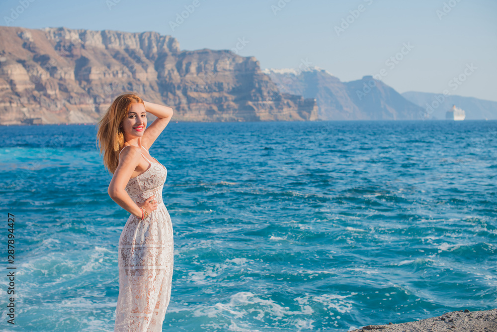 Freedom concept, redhead woman rest at sea, vacation and holidays time. Freedom concept, redhead woman rest at sea, vacation and holidays time.