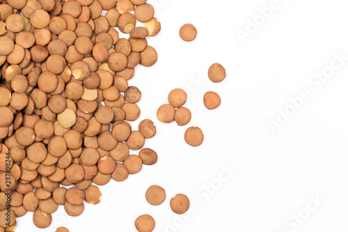 Pile lentil isolated on white background. Top view.