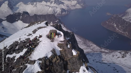 Drone aerial video from the Keipen peak at Senja Island in Spring season with snow. photo