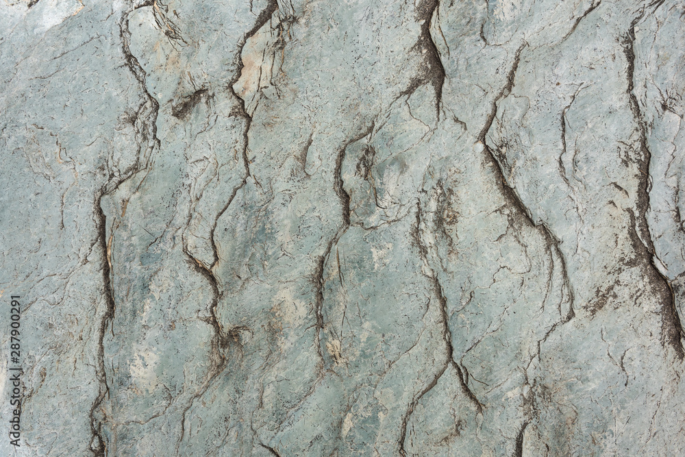 Fototapeta premium Natural colored rock crack texture closeup