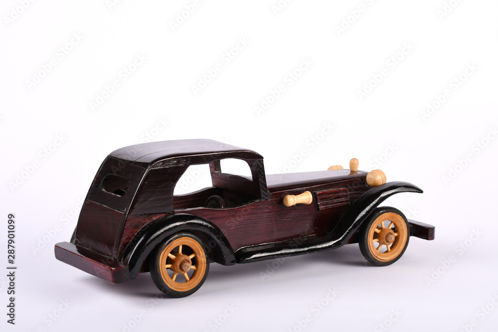 Vintage wooden classic toy car on white background	