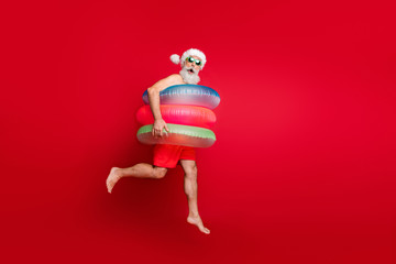 Full length body size view of nice handsome cheerful cheery funky glad positive comic childish playful wondered bearded gray-haired man hurry rush isolated on bright vivid shine red background