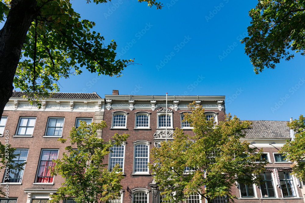 Apartments and houses in street called Oude Delft. In Delft, The Netherlands Apartments and houses in street called Oude Delft. In Delft, The Netherlands