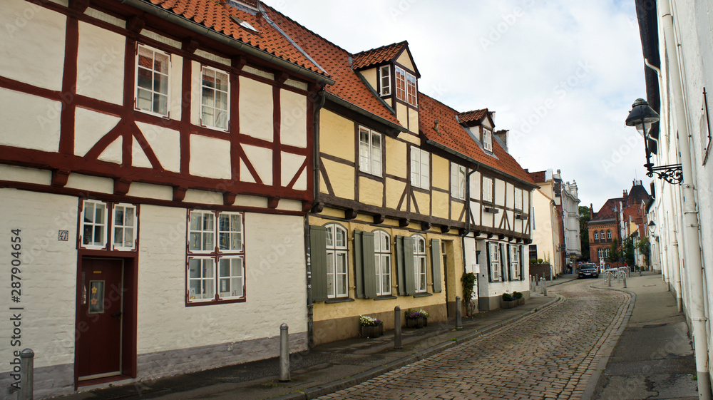 View of the houses of the street An der Mauer, beautiful architecture, Lubeck, Germany