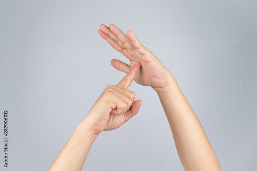 Naklejka premium TimeOut sign and simbol from Asian human hand with isolate white background and clipping path.