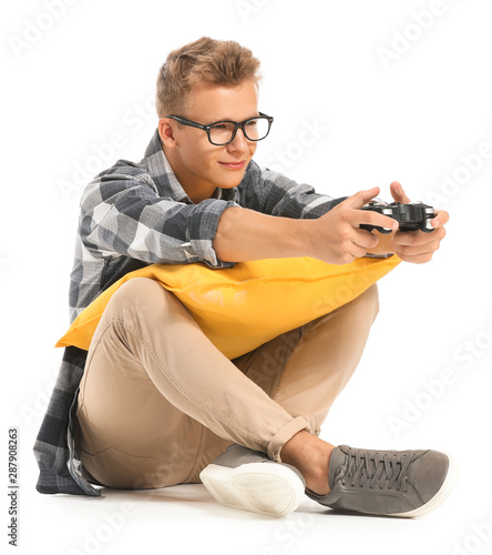 Teenage boy playing video g...
