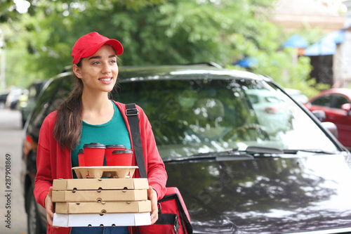 Female worker of food deliv...