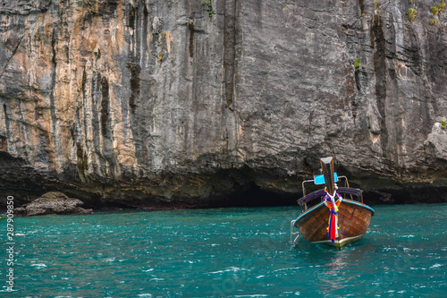 Thai traditional wooden longtail boat in Phi-Phi island, Phuket, Thailand 