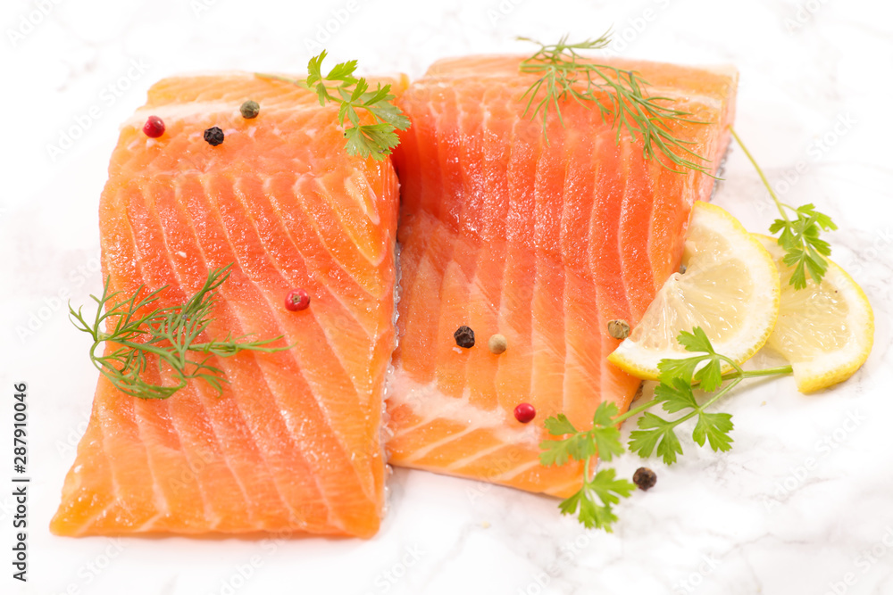 raw salmon on board with lemon and parsley raw salmon on board with lemon and parsley